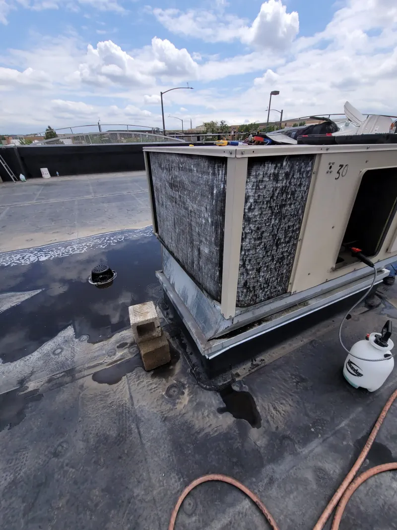 HVAC coil cleaning by BES technician