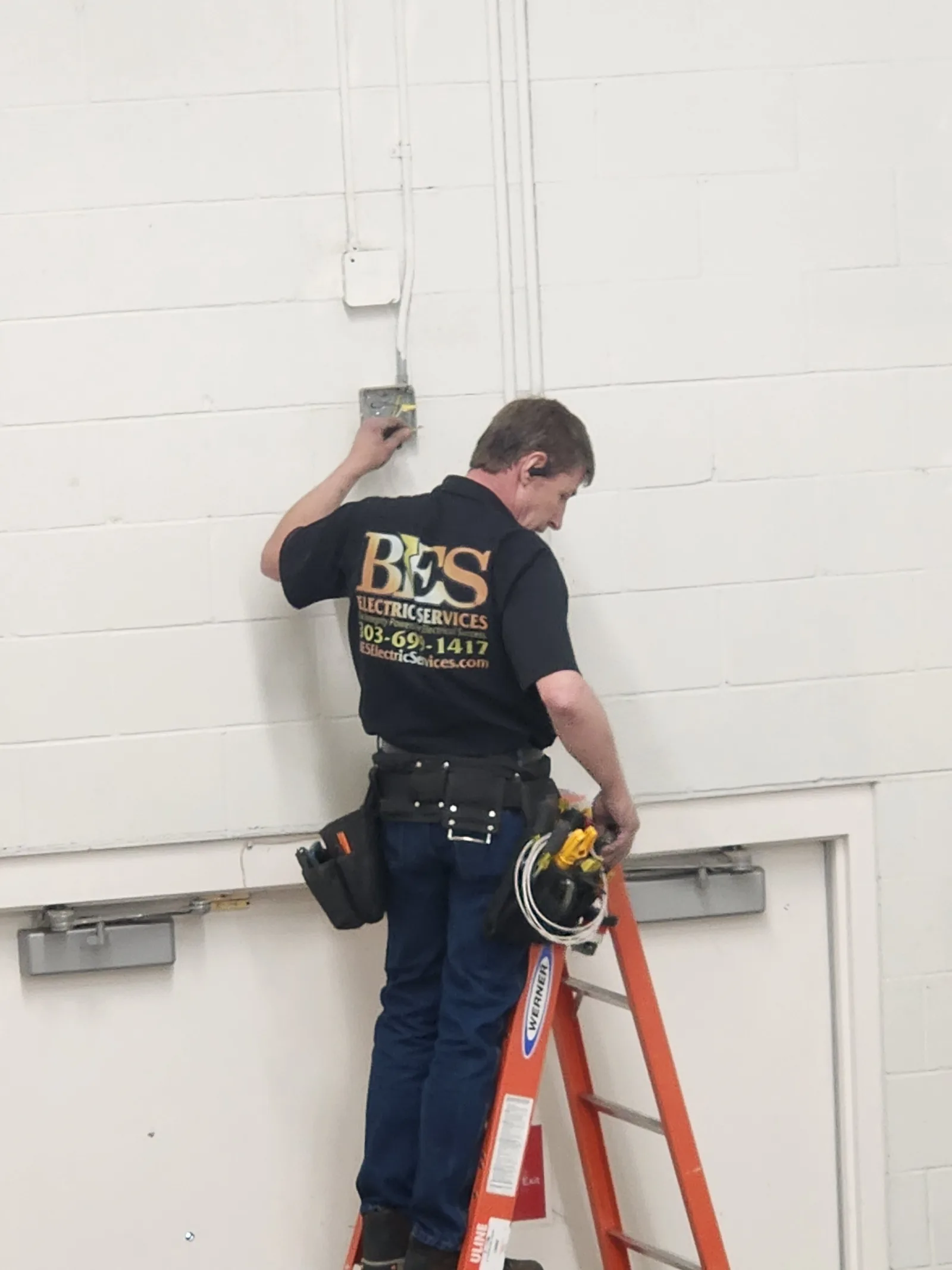 BES electrician at a residential panel